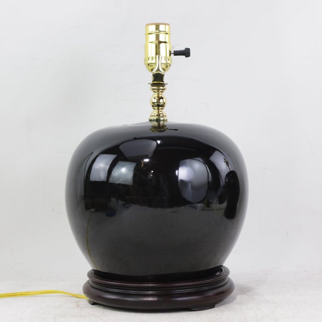 A Pair Early 20th Century Black Monochrome Porcelain Watermelon Jar Table Lamps on Carved Wood Bases For Sale - Image 12 of 15