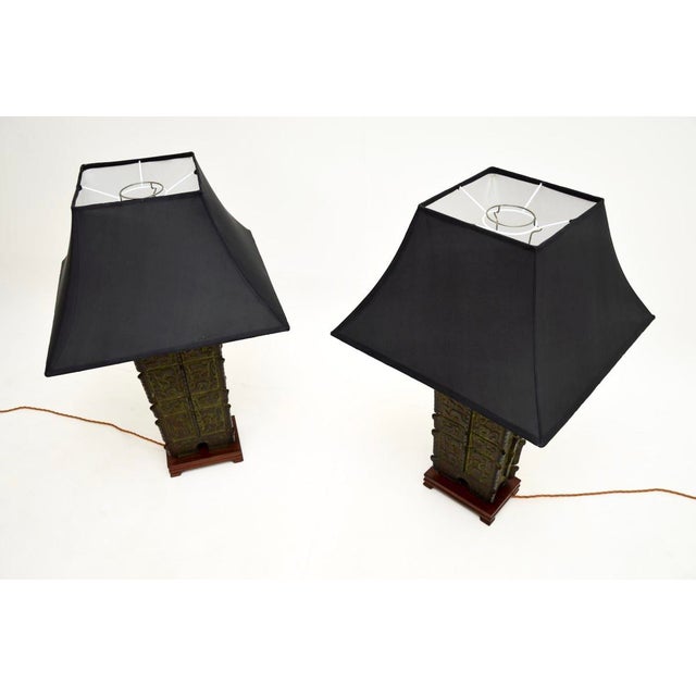 An outstanding pair of large antique bronze oriental table lamps. They were most likely made in China, they date from...