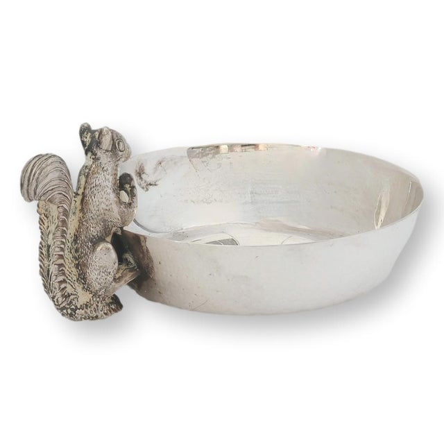 Mid 20th century English silverplate trinket dish featuring a wonderfully detailed squirrel perched at the side holding a...