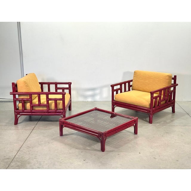 1970s bamboo living room set by Vivai del Sud, two armchairs and a coffee table (83x80x26h cm) with a smoked glass top,...