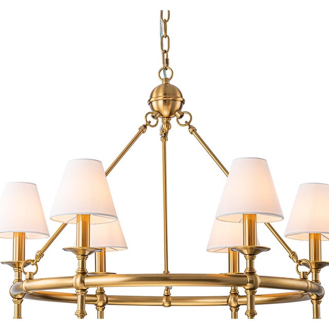 This ALOADECOR statement chandelier is finished in warm brass and accented with natural alabaster finials. Six tapered...