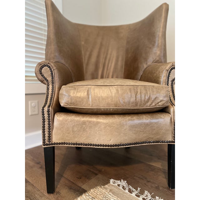 Experience the perfect blend of luxury, comfort, and enduring style with this exceptional Stanford leather wingback chair....