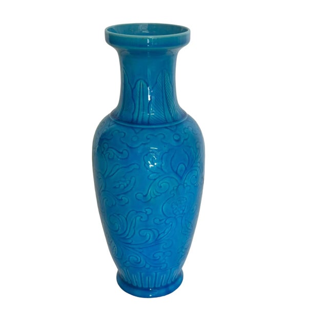 An early 20th century Chinese peacock blue rouleau shaped vase.