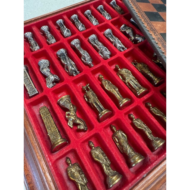 Elegant vintage chess set inspired by Italian Grand Tour artistry, dating from the 1970s. The sculptural pieces are cast...