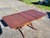 Drexel mahogany drop leaf table with additional leaf. Genuine Duncan Phyfe stamped on the bottom. Double pedestal base,...
