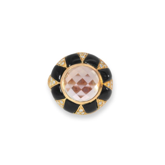 This gorgeous 14K pink gold amethyst cocktail ring is a stunning statement piece that combines vibrant color and sparkling...