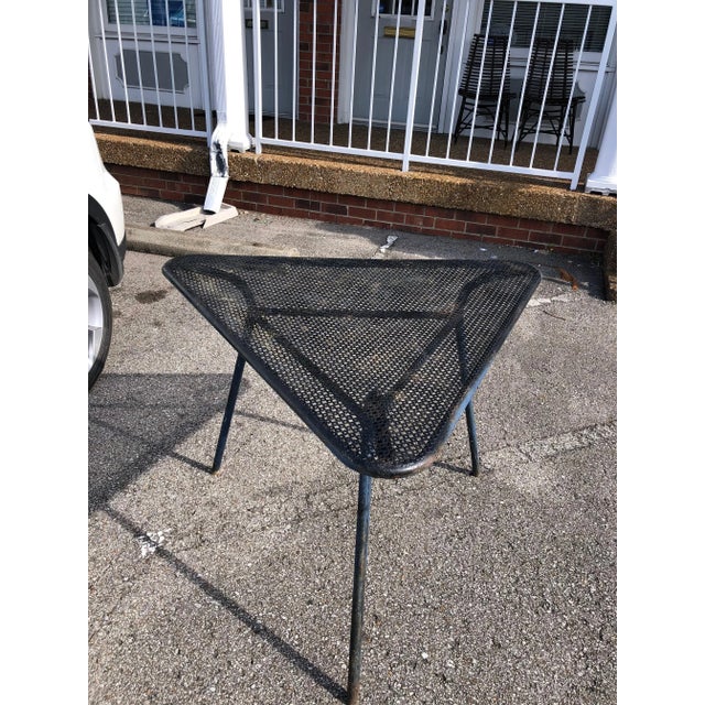 Unique vintage wrought-iron table, indoor or outdoor. each side measures 41" long, height is 29". No label, appears to be...