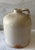Vintage stoneware crock whiskey jug (approximately 5 gallon). Heavy stoneware construction with a handle and wonderful...