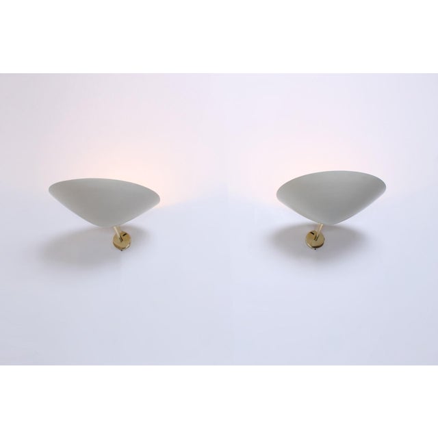 Impressive set of two large metal wall lights, designed by Giuseppe Ostuni for Oluce in 1951. Model called 'Applique 131'....