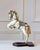 Charming and sculptural, this French decorative horse from the 20th century captures the elegance and vitality of...