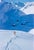 Snow Plough by Toni Frissell A lone skier heads down into the valley at the St. Anton ski resort, lying in shadow of one...