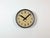 This wall clock was produced by IBM in USA during the 1950s. It features a black metal frame, iron dial, aluminium hands...
