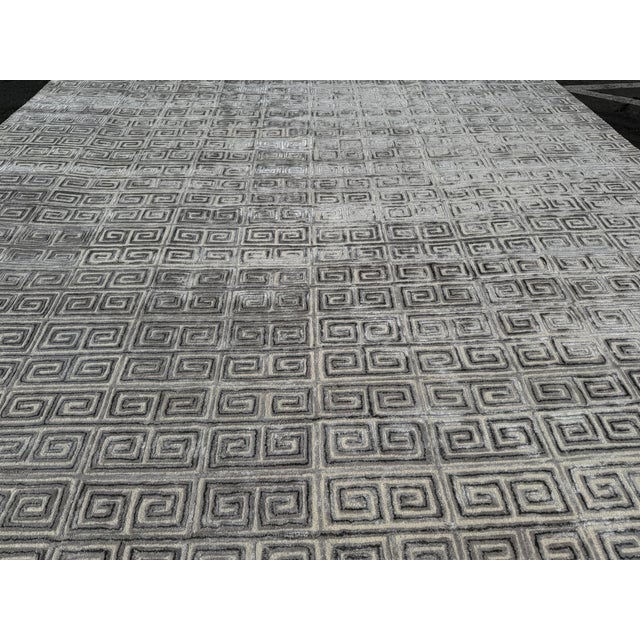 Design Plus Gallery presents the 12ft 8in x 19ft 9in Greek Key Area Rug from Decorator's Best. The rug has a classic motif...