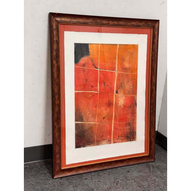 Design Plus Gallery presents a Custom Framed Abstract Mixed Media Artwork. In a vivid orange palette with gestural line...