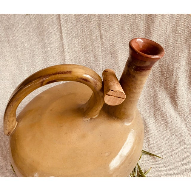 A beautiful handmade terracotta wine vessel that seamlessly bridges ancient tradition with contemporary artistry. This...
