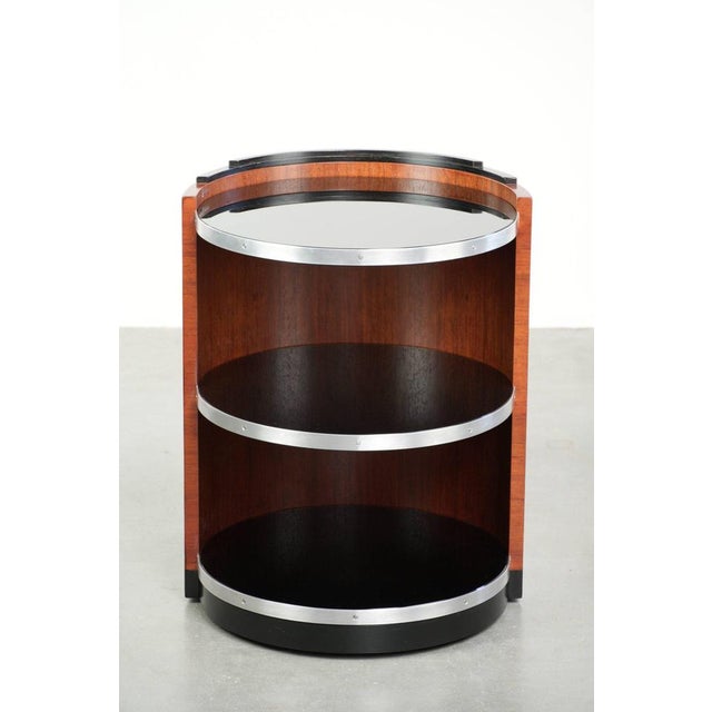 This special and mobile side table/bar table with black glass tops is from the top Dutch brand Schuitema and comes from...