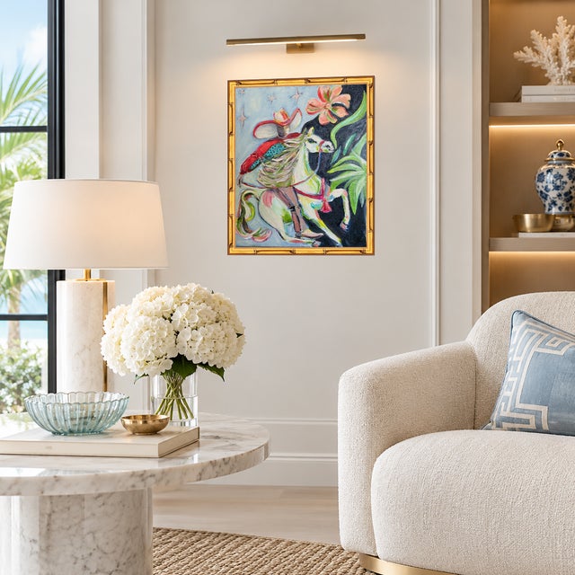 Finished in a gilded gold bamboo-style frame that perfectly complements the warm, vibrant palette. Ready to hang as...