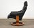 A black leather Stressless Recliner lounge chair in a soft black leather made by Ekornes with a teak base. Made in Norway....