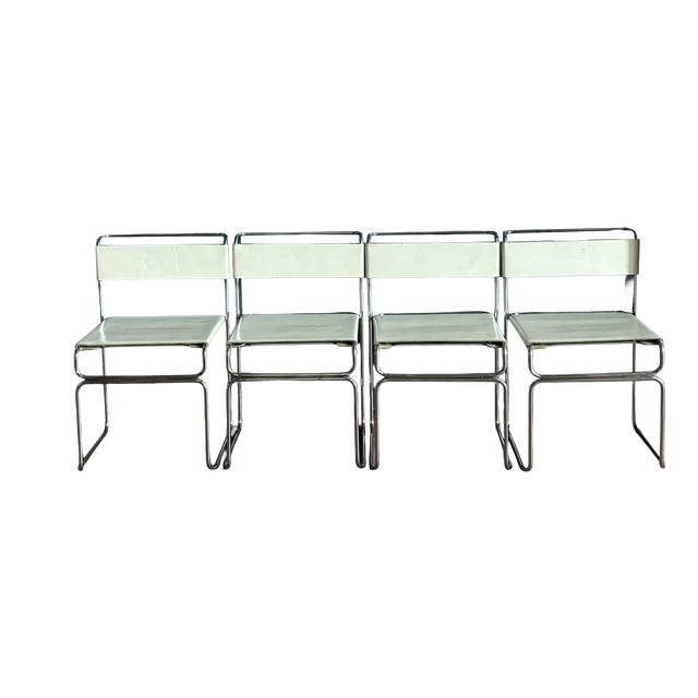 Vintage Cream Leather Stackable Chairs attributed to Giovanni Carini for Planula, Italy, Early 1970s, Set of 4 For Sale