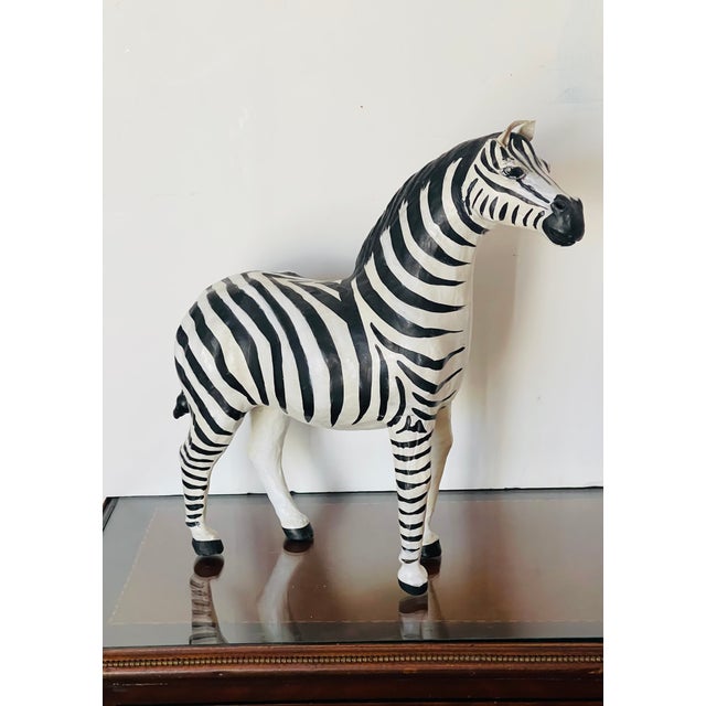 Vintage 20 th century paper mache handmade and handpainted tropical zebra figurine.