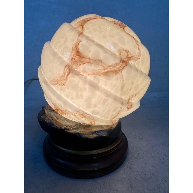 Art Deco table lamp with marbled opaline glass and synthetic bronze. Stamped: J.M. Made in Belgium. Original wiring and...