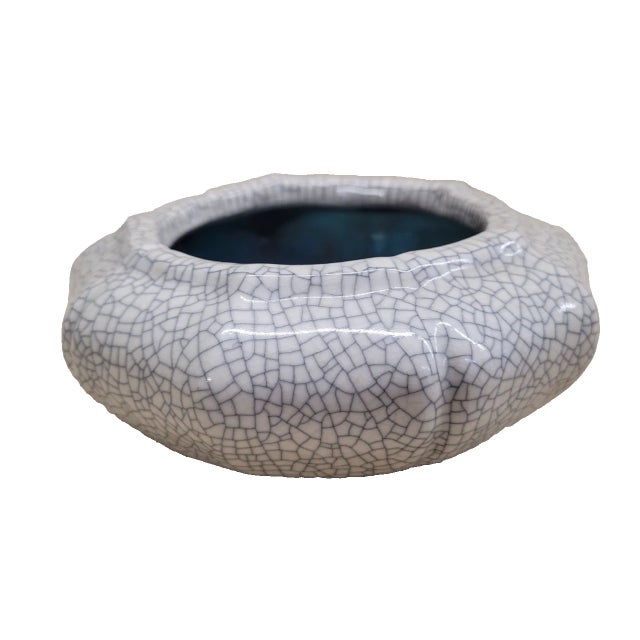 A striking mid-century Chinese ceramic catchall bowl featuring a mesmerizing iridescent turquoise interior and fine Ge-...