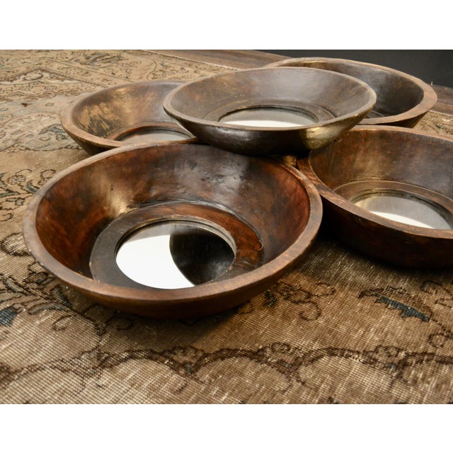 Lovely set of 5, handmade primitive style dough bowls that have been converted to mirrors. Include hook for wall hanging....