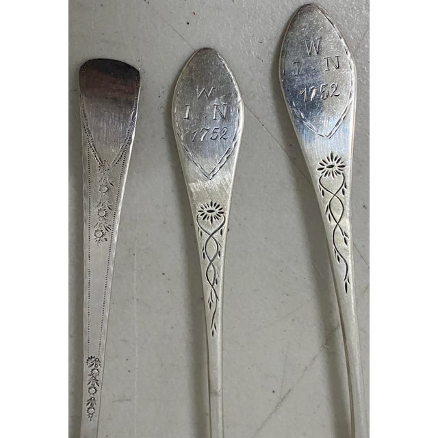 Three Early American Mid 18th Century Etched Sterling Spoons C.1752 Two spoons etched on the back with name One spoon...