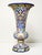 A polychrome earthenware trumpet vase from Nevers, signed by Antoine Montagnon, illustrating the great Nevers tradition of...
