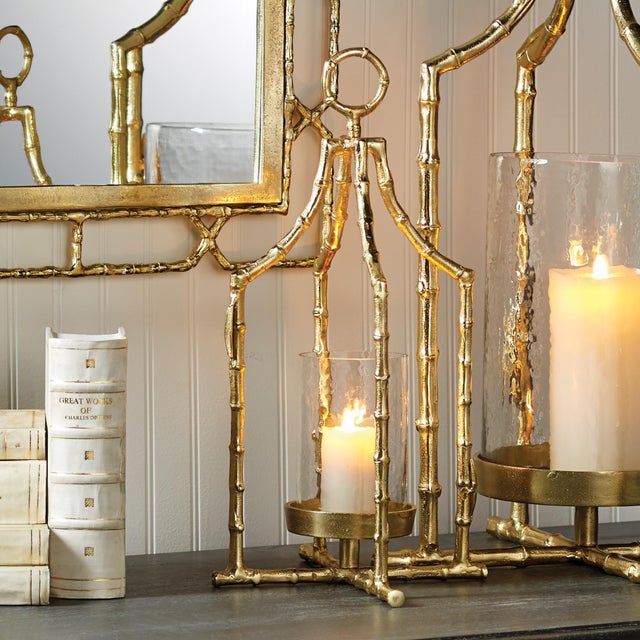 TheGold bamboolike structure and seeded glass insert are a great way to dress up your space. Design includes a loop to...
