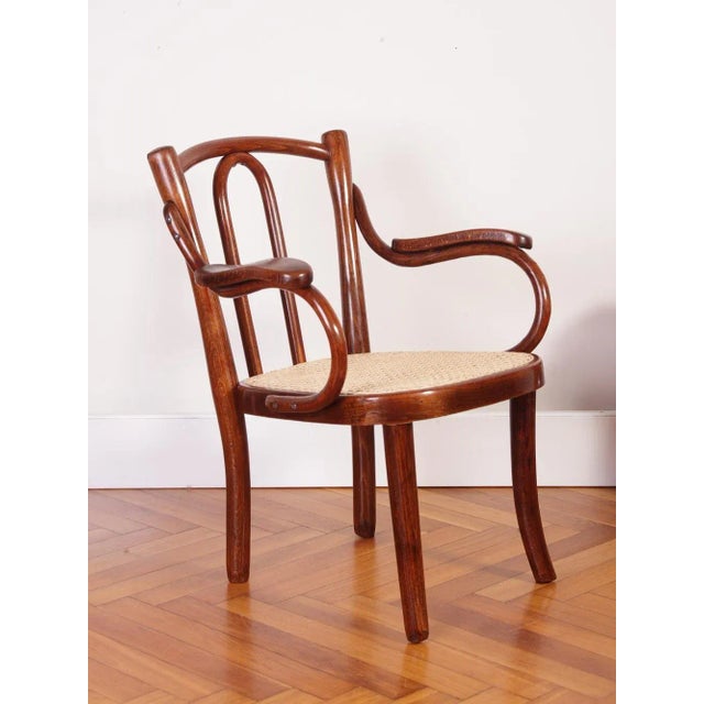 Completely restored kid chair with seat height of 29 cm suitable for 2-4 years old. Marked Thonet. This piece has an...