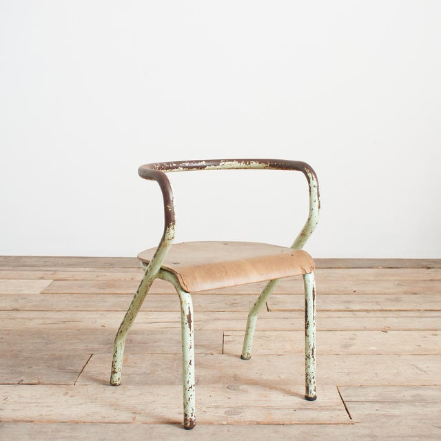An original vintage children’s chair designed by Jacques Hitier in 1949 and produced by Mullca under the reference “Mullca...