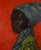 A dignified African woman in vibrant fabrics and traditional facial markings - a celebration of heritage. Pairs with "My...