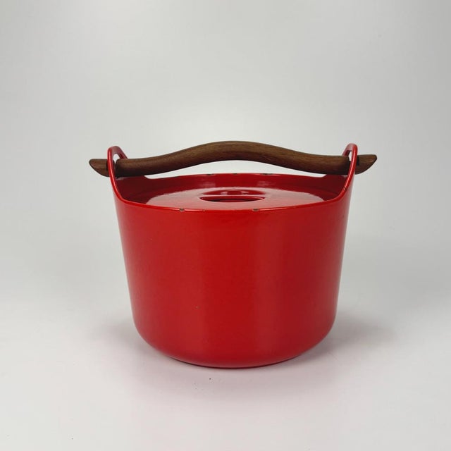 Red Enamel and Cast Iron Pot by Timo Sarpaneva for Rosenlew of Finland, 1960s, in Very Good conditions. Designed 1960 to...