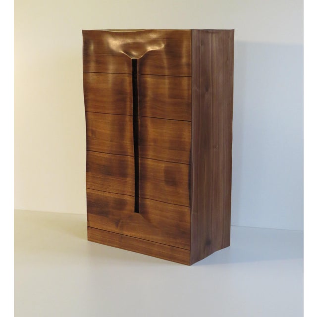 Solid wood chest of drawers "The Groove" with an organic design. Designed and crafted by German master carpenter and...
