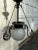 Old Lights On is pleased to iffer this vintage hanging fixture with vintage round frosted glass shade. It is wired and...