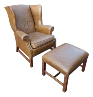 Wingback Leather Armchair and Matching Ottoman by Classic Leather.
