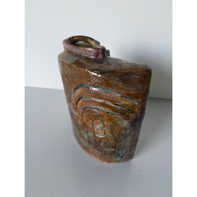 Unique 1980s vintage studio pottery vessel featuring a sculptural asymmetrical form with a distinctive divided double-neck...