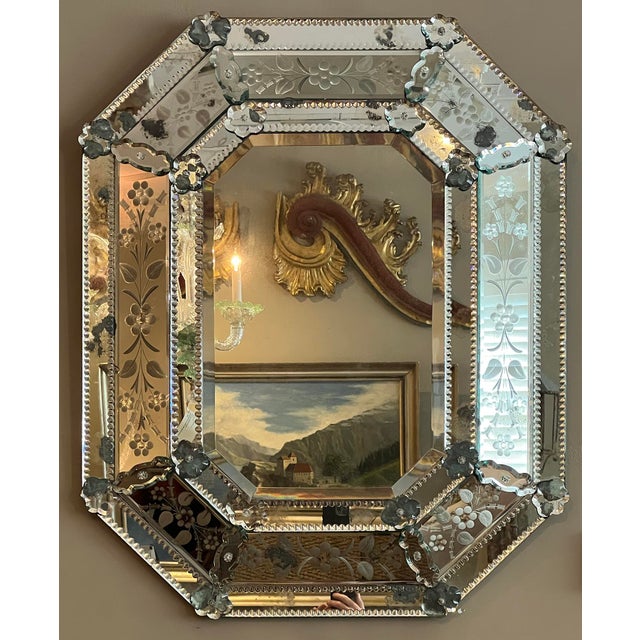 octagonal beveled central plate within a clear glass cushion frame featuring reverse-etched floral and foliate sprays all...