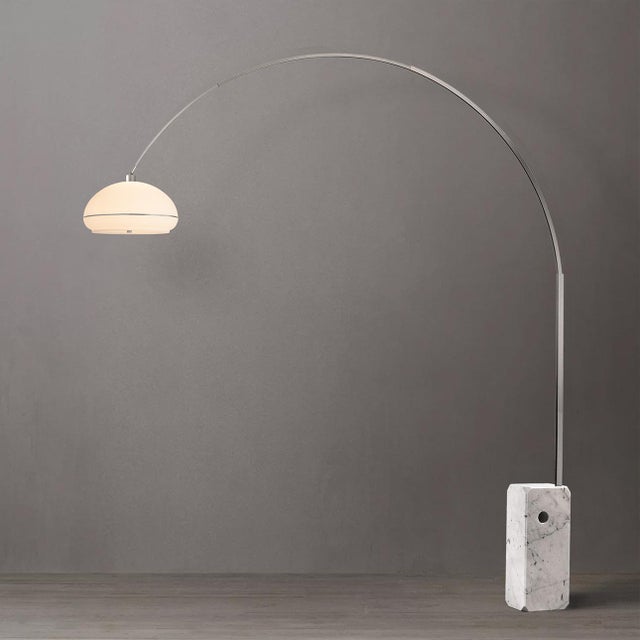The Iconic Arc Lamp is a dimmable Mid-Century Modern arc lamp with a satin nickel finish, offering adjustable light...