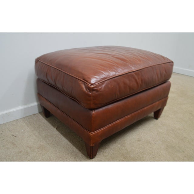 Polo Ralph Lauren Ottoman. Store item #578. It features wooden feet and leather upholstery.