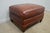 Polo Ralph Lauren Ottoman. Store item #578. It features wooden feet and leather upholstery.