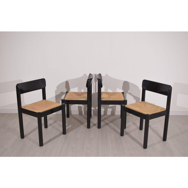 A refined set of four chairs designed by Vico Magistretti for Schiffini in the 1970s, an iconic example of essential and...