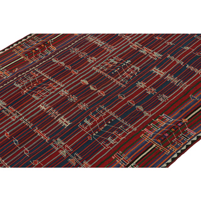 This vintage 7x9 Shahsavan kilim is a unique tribal rug for its period—hailing from Persia circa 1950-1960. Handwoven in...