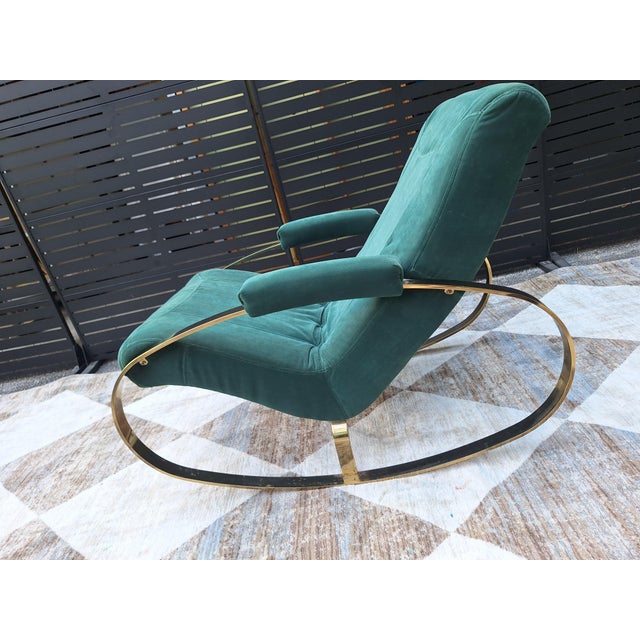Sophistication at its finest. This deep green rocker features a heavy oval or "elliptical shaped steel frame with...