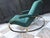 Sophistication at its finest. This deep green rocker features a heavy oval or "elliptical shaped steel frame with...