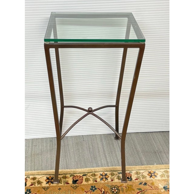 Design Plus Gallery presents a Side Table with Contemporary Appeal. The tall side table has a burnished steel frame with...
