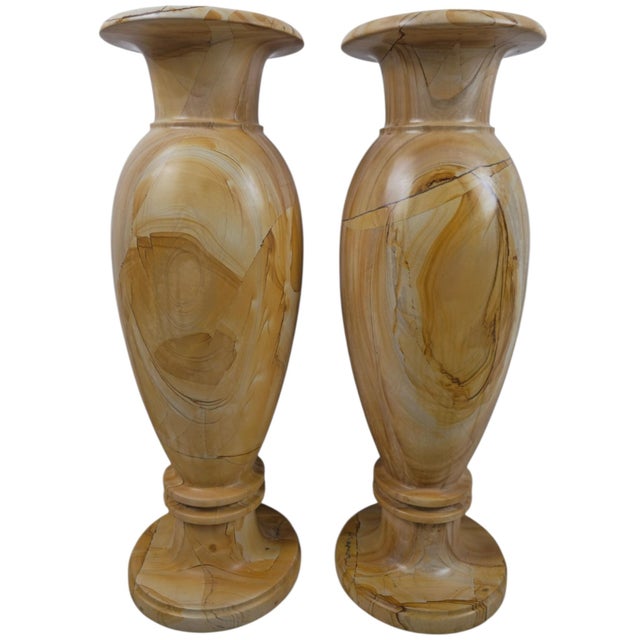 A pair of very decorative marble vases made from teakwood marble, dating from the 20th century, around 1980. Each vase is...