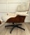 This vintage 1960-1970s Eames-style lounge chair and ottoman features beautifully molded walnut veneer shells paired with...