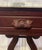 An exceptional and beautifully preserved pair of antique American Empire style mahogany parlor tables, dating to the late...